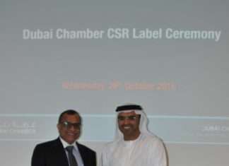CSR Label certificate presented to Eugene May by Dubai Chamber of Commerce.