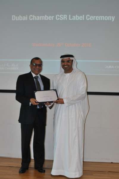 CSR Label certificate presented to Eugene May by Dubai Chamber of Commerce.