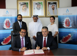 Managing Director and Group CEO of Gulf Navigation, Khamis Juma Buamim, attending signing ceremony with Deloitte