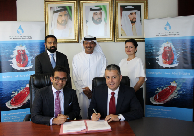 Managing Director and Group CEO of Gulf Navigation, Khamis Juma Buamim, attending signing ceremony with Deloitte