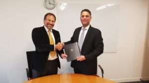 Tarik Al Junaidi and Mike Muller after signing the COA agreement