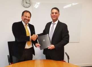 Tarik Al Junaidi and Mike Muller after signing the COA agreement