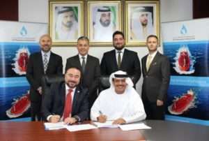Joint venture agreement signed between Khamis Juma Buamim of Gulf Navigation and Aydin Alaftan of Polimer in Dubai