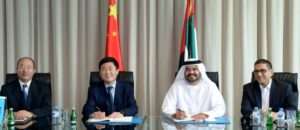 Chief Executive of Jafza and Senior Vice President and Managing Director of DP, UAE Region, Mohammed Al Muallem, and Chief Executive of CNPC Middle East, Zhu Junfen sign the agreement for CMPC to establish its regional HQ in Dubai