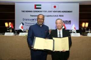 Ramesh S. Ramakrishnan and Takahiro Suzue sign the joint venture agreement