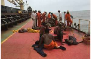 Rescued fishermen on the deck of the Dubai Knight