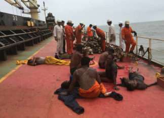 Rescued fishermen on the deck of the Dubai Knight