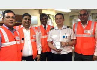 The Captain of CMA-CGM Virginia receiving a memento of the maiden call into APM Terminals Mumbai