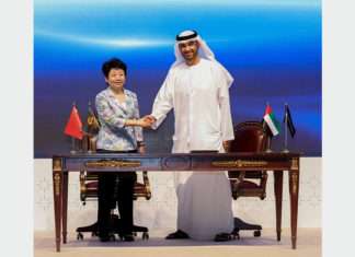 H.E. Dr. Sultan Ahmed Al Jaber, Abu Dhabi Minister of State, and Madame Huang Lixin, Executive Vice Governor of Jiangsu Provincial People’s Government, sign the investment agreement