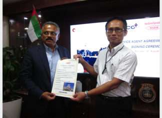 John Thomas, Chief Operating Officer, Nico International, and Masayoshi Aoki, Chief Operating Officer for Nishishiba Marine business, celebrate the agreement