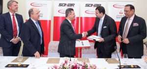 Executives from Sohar Port and Freezone and ShriVallabh Pittie Group signing the land lease MOU