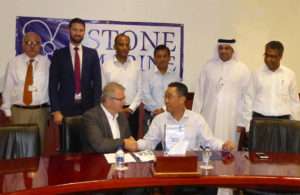 DDW Chief Operations Officer, Mohammad Rizal shaking hands with Don Quilliam, Managing Director of Stone Marine Shipcare, with senior executives from both company’s looking on.