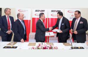 Executives from Sohar Port and Freezone and ShriVallabh Pittie Group signing the land lease MOU