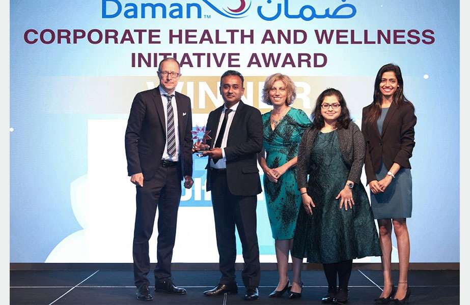 story-12 The Gulftainer HR team receiving the corporate health award