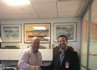 Phil Davies, left, general manager, marine transportation, Chevron Shipping Company, congratulates Lars Hardeland, managing director of GAC’s global hub services on securing the global oil and LNG shipping contract