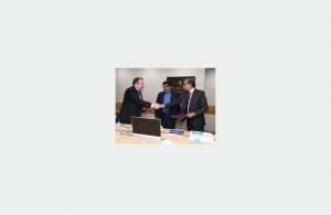 Shri Madhu S Nair, chairman and managing director, CSL, shakes hands with Alexey Rakhmanov, president of USC, in the presence of Shri Nitin Gadkari, Indian shipping minister