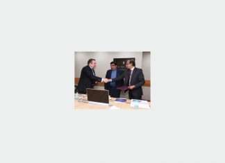 Shri Madhu S Nair, chairman and managing director, CSL, shakes hands with Alexey Rakhmanov, president of USC, in the presence of Shri Nitin Gadkari, Indian shipping minister
