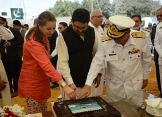 At a cake-cutting ceremony to mark the deliver of the two new vessels, from left to right, Mrs. Ardi Stoios-Braken, the Ambassador of the Embassy of the Kingdom of the Netherlands to the Islamic Republic of Pakistan, Dr. Miftah Ismail, Advisor to the Prime Minister on Finance, Revenue & Economic Affairs and Rear Admiral Syed Hasan Nasir Shah, Managing Director of KSEW