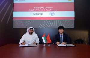 Abdulla Al Hameli, Executive Vice President, Corporate Support, Abu Dhabi Ports and Zhou Guangyao, Representative of the China Council for the Promotion of International Trade for the GCC region signing the new MOU agreement