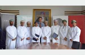 Executives from Marafi and Khazaen Economic City at the signing of the dry port MOU