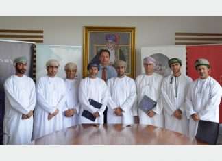 Executives from Marafi and Khazaen Economic City at the signing of the dry port MOU