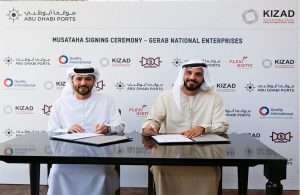 Capt. Mohamed Juma Al Shamisi of Abu Dhabi Ports signing the agreement with Abdullah Sharafi, president, Gerab Group