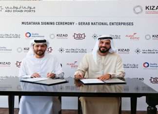 Capt. Mohamed Juma Al Shamisi of Abu Dhabi Ports signing the agreement with Abdullah Sharafi, president, Gerab Group