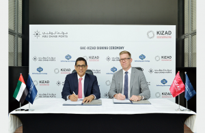 Samir Chaturvedi, Kizad chief executive, and Göran Eriksson, GAC Abu Dhabi managing director, signing the agreement to open warehousing and open yard areas in the free zone