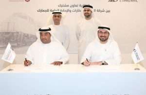 Rashed Lahej Al Mansoori, Director General of the General Administration of Customs in Abu Dhabi, and Shadi Malak, Chief Executive Officer of Etihad Rail, sign the MOU
