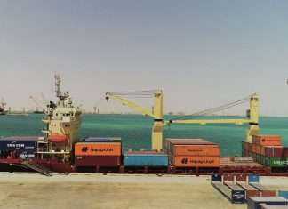 Hapag Lloyd containers being offloaded in Duqm port