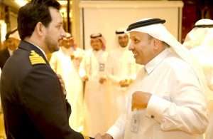 Bahri VLCC fleet manager, chief engineer Abdullah Al-Yami, being presented to the TGA president, H.E. Rumaih Al Rumaih