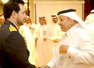 Bahri VLCC fleet manager, chief engineer Abdullah Al-Yami, being presented to the TGA president, H.E. Rumaih Al Rumaih