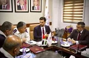 Officials from Jordan Customs and TradeLens discussing the new system that will be tested in Aqaba