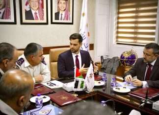 Officials from Jordan Customs and TradeLens discussing the new system that will be tested in Aqaba