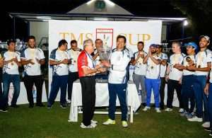 Winning Captain of TMS, Trevor Pereira receiving the TMS Cup from Freddy Sidhwa, Captain of the Rest of Shipping.