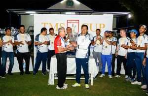 Winning Captain of TMS, Trevor Pereira receiving the TMS Cup from Freddy Sidhwa, Captain of the Rest of Shipping.