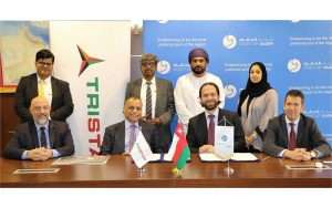 Eugene Mayne of Tristar signing the new logistics deal at the port of Duqm