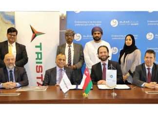 Eugene Mayne of Tristar signing the new logistics deal at the port of Duqm