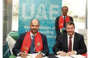His Excellency Falah Mohammad Al Ahbabi, Chairman of Abu Dhabi Ports, signing the MOU to develop the unmanned tug design with Mike Fitzpatrick, President and CEO of RAL