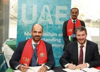 His Excellency Falah Mohammad Al Ahbabi, Chairman of Abu Dhabi Ports, signing the MOU to develop the unmanned tug design with Mike Fitzpatrick, President and CEO of RAL