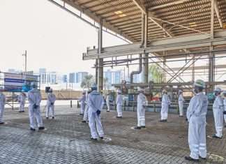 Staff at Drydocks World mark the start of steel cutting for the construction of the new FPSO turntable