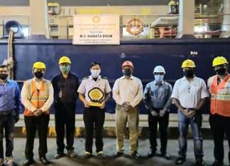 Port officials mark the maiden call of the Nawata Bhum at HITC