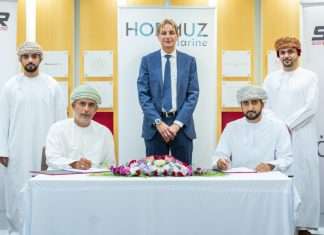 Executives from Sohar Port and Hormuz Marine signing the round-the-clock bunker fuel supply agreement