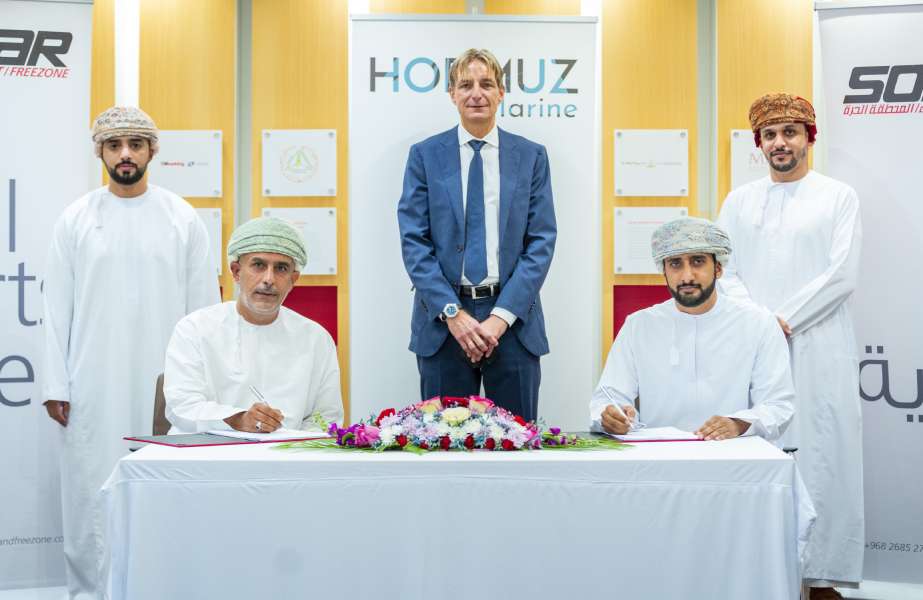 Executives from Sohar Port and Hormuz Marine signing the round-the-clock bunker fuel supply agreement