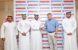 QTerminals and Ooredoo executives marking the completion of Phase 1 of the 5G coverage of Hamad Port’s CT 2 facility