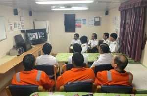 Crew members of Tristar Dana watching the live streaming of the conference