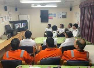 Crew members of Tristar Dana watching the live streaming of the conference