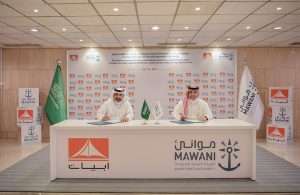 The logistics agreement with Abyat being signed by H.E Mr. Omar Talal Hariri, President of Mawani, and Yasser Hassan Abul, Chairman of Abyat