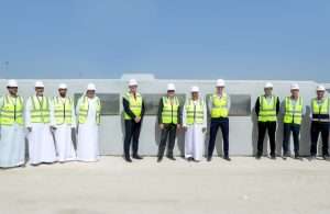 Executives attending a ceremony to mark the placing of the first quay block at the new CMA CGM Khalifa terminal