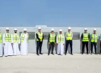 Executives attending a ceremony to mark the placing of the first quay block at the new CMA CGM Khalifa terminal